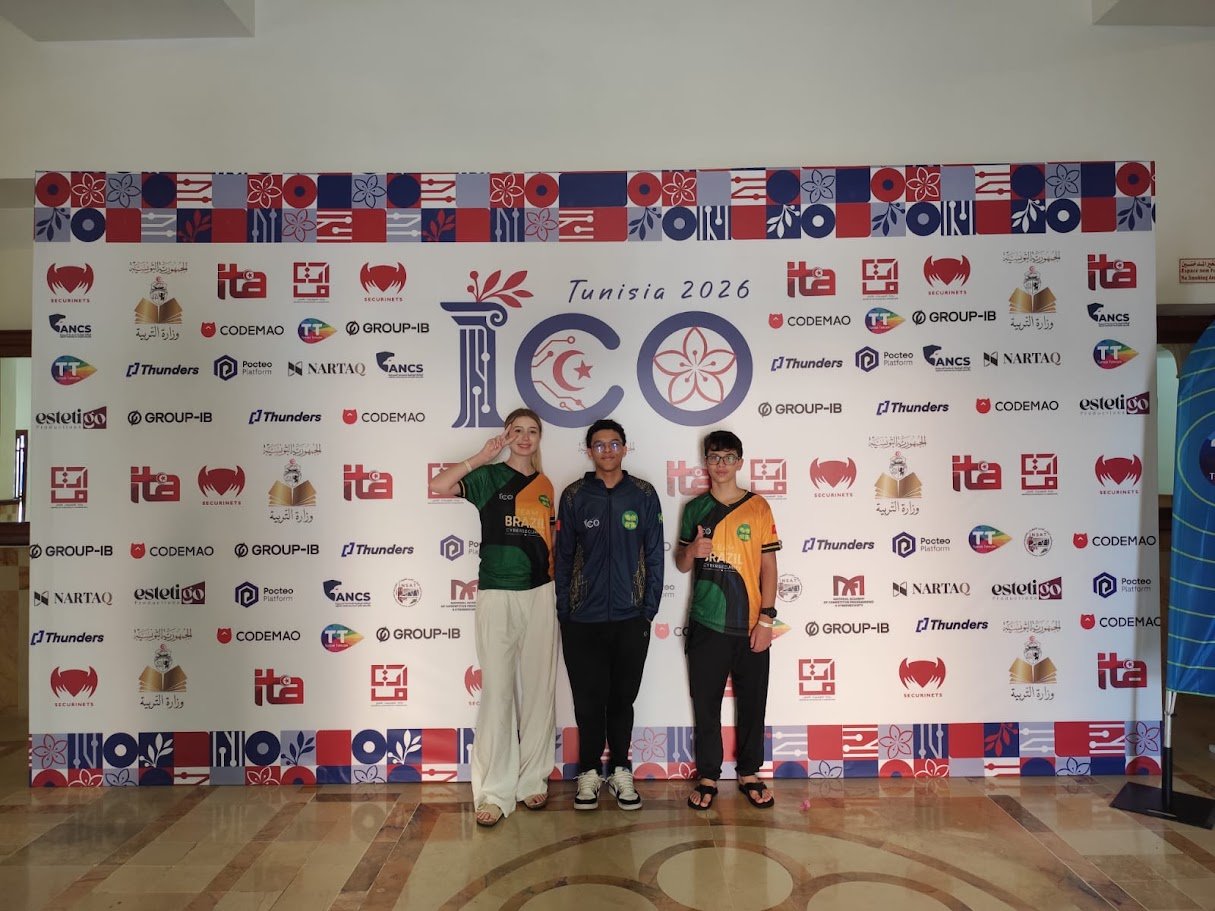 Equipe brasileira com a bandeira do Brasil